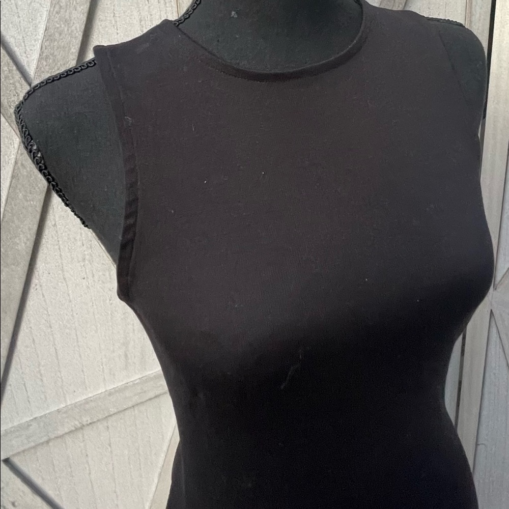 Black midi dress with a slit on each size medium. Purchased from Amazon.